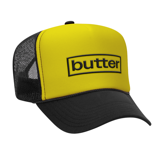 yellow & black butter trucker hat